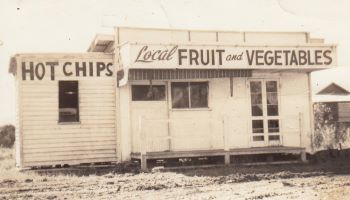 Archival photograph of a small commercial building believed to be connected with the original church history