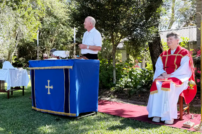 A speaker at the outdoor altar during a spring service at The Abbey Church.